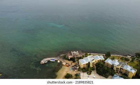 An Aerial View Of Seaside Hotel Buildings