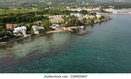 An Aerial View Of Seaside Hotel Buildings