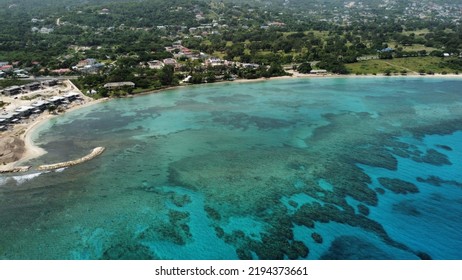 An Aerial View Of Seaside Hotel Buildings