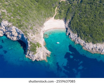 Aerial view of secluded beach with turquoise water and boat. - Powered by Shutterstock