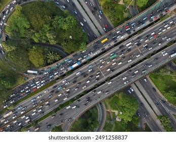 An aerial view of Semanggi Bridge (simpang susun semanggi) jakarta during rush hour - Powered by Shutterstock