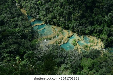 Aerial view of Semuc Champey,  a natural monument located in a densely forested mountains of Alta Verapaz, near the town of Lanquin, Guatemala.  - Powered by Shutterstock