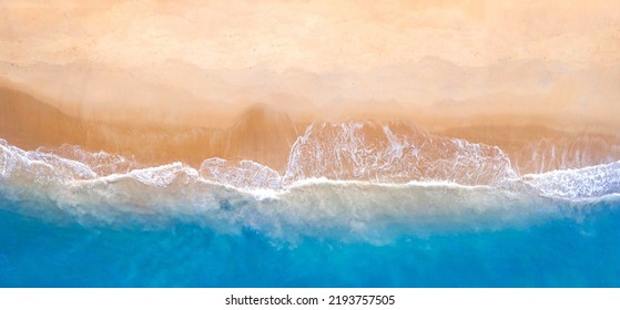 aerial view  Separated Sea Blue waters on both sides of the contrasting with the beach, naturally beautiful. and the wonders of tropical wave waters and paradise beaches in the Andaman Sea.  - Shutterstock ID 2193757505