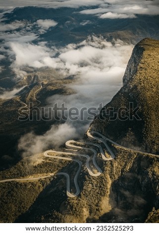 An aerial view of Serra da Leba road winding through a mountainous landscape