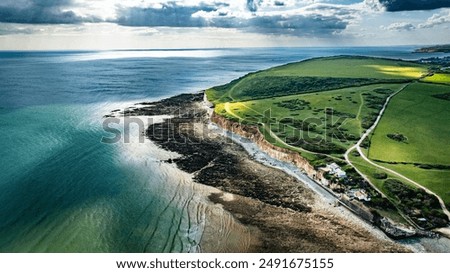 Similar – Image, Stock Photo Idyllic coastal landscape with waterfall