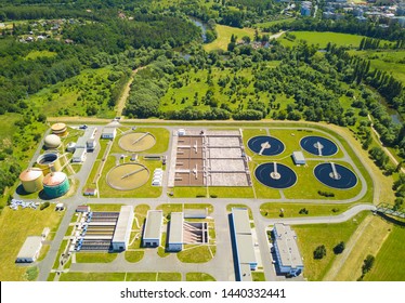 Aerial View Of Sewage Treatment Plant. Industrial Water Treatment For Big City From Drone View. Waste Water Management.