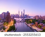 Aerial view of Shanghai skyline with Beautiful fire clouds at sunrise