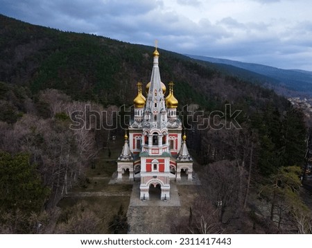 Aerial view of Shipka Memorial Church in Bulgaria. Drone view of Monastery Holy Nativity, known as Russian church in town of Shipka, Stara Zagora Region, Bulgaria. Birth of Christ with Golden domes.
