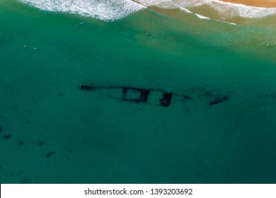 aerial view of a shipwreck at Wategoes Beach in Byron Bay. The Photo was taken out of a Gyrocopter, Byron Bay, Queensland, Australia