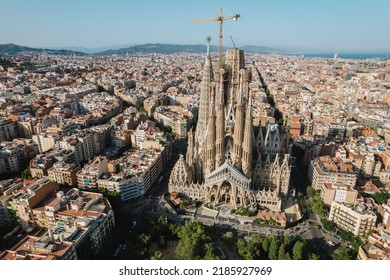 Aerial View Shot Of La Sagrada Familia Basilica Barcelona At Sunrise. Cinematic 4K