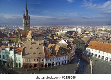Aerial view of Sibiu old town in Transylvania, Romania, Lutheran cathedral tower and Small Square (Piata Mica) - Shutterstock ID 92159089