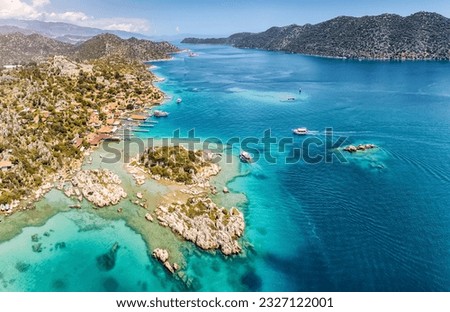 Aerial view of Simena castle and fishing and tourist village Kaleucagiz and Kekova sunken city. Tourist and travel destinations in Turkey