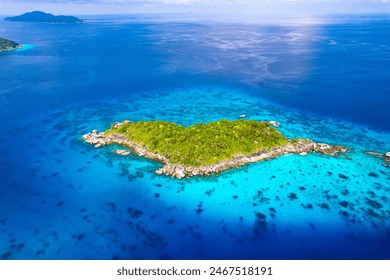 Aerial view of the Similan Islands, Andaman Sea, natural blue waters, tropical sea of Thailand. the beautiful scenery of the island is impressive. - Powered by Shutterstock