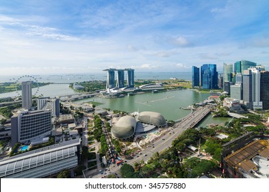 Aerial View Of Singapore Business District And City With Nice Sky. 