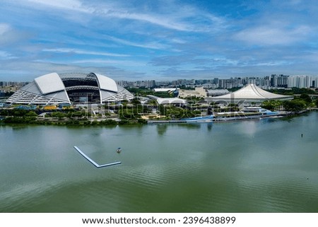 Aerial view of the Singpore National Stadium and Sports Hub next to the Kallang Basin and reservoir