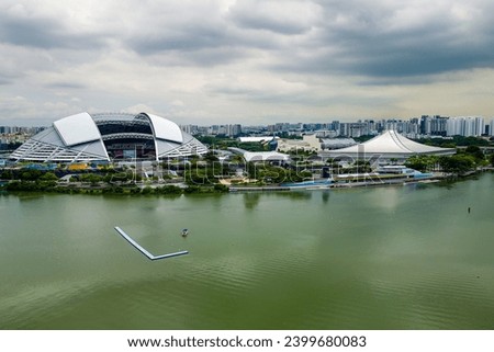 Aerial view of the Singpore National Stadium and Sports Hub next to the Kallang Basin and reservoir