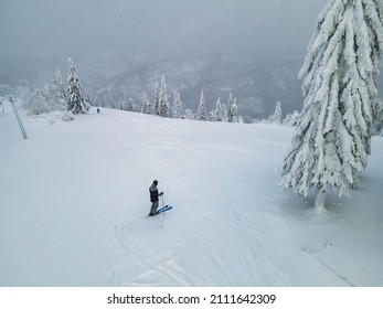 Aerial View Of Skier Free Rider At The Ski Slope Winter Extreme Sport