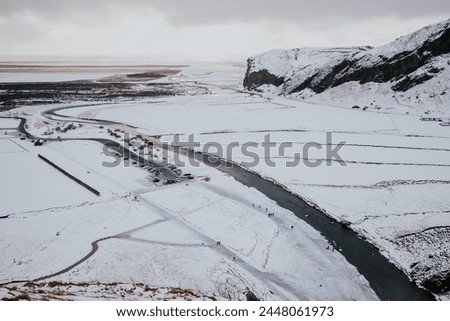 Aerial view of Skoga River in Skogar, Iceland on cloudy winter day