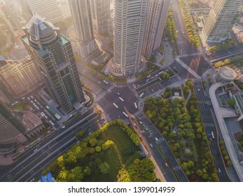 Aerial View Of Skyscraper And High-rise Office Buildings In Shanghai Downtown With Fog Or Mist, China. Financial District And Business Centers In Smart City In Asia At Sunrise.