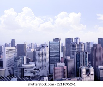 Aerial View Of Skyscrapers In Downtown Osaka, Japan. Top View Of Modern Osaka District. Photo Toned In Blue Color