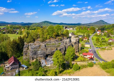 Aerial view of Sloup Castle in Northern Bohemia, Czechia. Sloup rock castle in the small town of Sloup v Cechach, in the Liberec Region, north Bohemia, Czech Republic.  - Shutterstock ID 2162913081