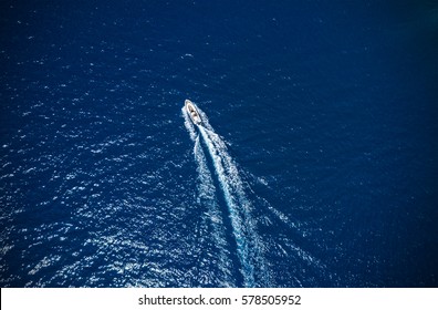 Aerial View Of Small Boat Flowing In Sea, Travel And Vacation Concept