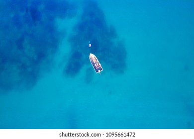 Aerial View Of Small Boat In Sea, Copyspace For Text