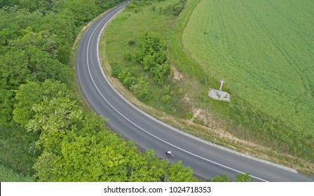 Aerial View Of A Small Country Road With A Big Bend