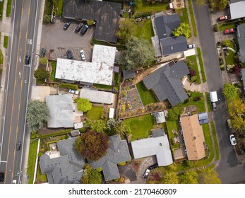 Aerial View. Small Green City, Suburb. Roofs Of One-story Houses, Outbuildings. There Are No People In The Photo. Map, Planning, Topography, Construction Industry, Ecology, Geography.