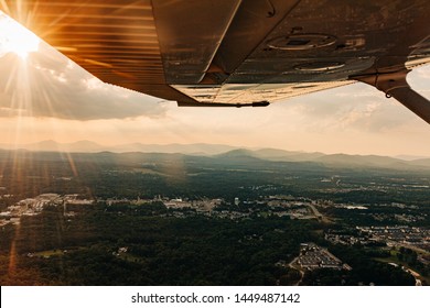 Aerial View From A Small Plane Flying Over Virginia, Lynchburg Close To A Sunset.