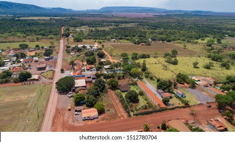 Aerial view of the small rural town Bom Jardim and surrounding, with mountains in the background, Mato Grosso, Brazil
