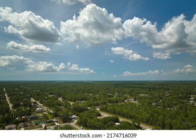 Aerial View Of Small Town America Suburban Landscape With Private Homes Between Green Palm Trees In Florida Quiet Residential Area