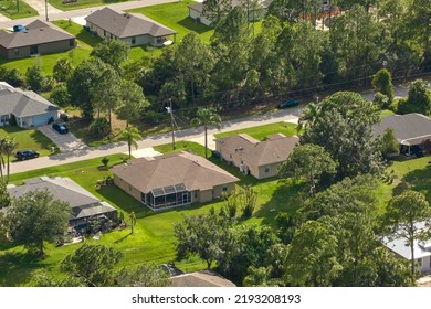 Aerial View Of Small Town America Suburban Landscape With Private Homes Between Green Palm Trees In Florida Quiet Residential Area