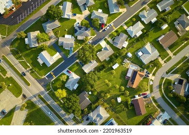 Aerial View Of Small Town America Suburban Landscape With Private Homes Between Green Palm Trees In Florida Quiet Residential Area