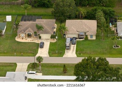 Aerial View Of Small Town America Suburban Landscape With Private Homes Between Green Palm Trees In Florida Quiet Residential Area