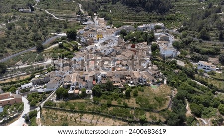 Aerial view of the small town of Benialí, located in the Gallinera valley north of Alicante, Spain. Town in the Valencian Community, known for its hiking trails. Depopulation concept
