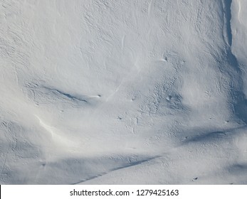 Aerial view of snow covered mountain with impressive structure - Powered by Shutterstock