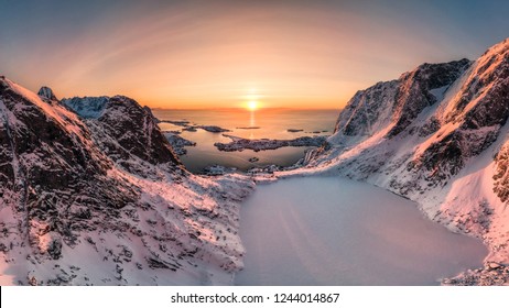 Aerial View Of Snow Mountain Range With Frozen Lake On Reinebringen At Sunrise Morning