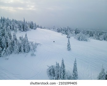 Aerial View Of Snowboarder Free Rider At The Ski Slope Winter Extreme Sport