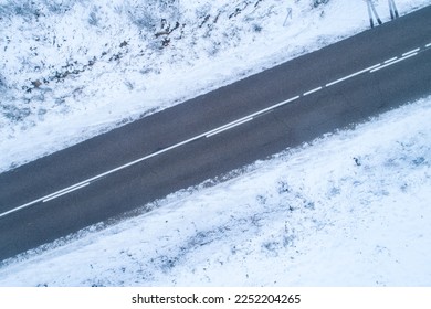 aerial view of a snow-covered road in winter. Galicia, Spain.