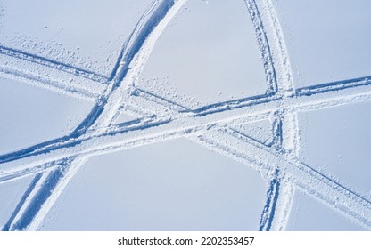 Aerial View Of Snowmobile Tracks