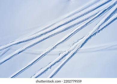 Aerial View Of Snowmobile Tracks