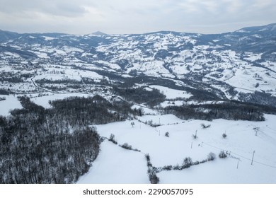 Aerial view of snowy mountain winter white landscape Vezzolacca , Emilia Romagna, Italy - Powered by Shutterstock