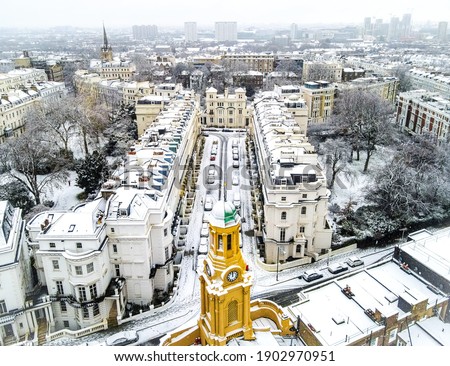 Aerial view of snowy Notting hill area in London, UK