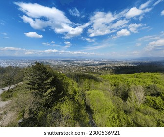 Aerial view of Sofia, Bulgaria overlooking the Sofia valley and Balkan mountains in the background, with Vitosha National Park in the foreground