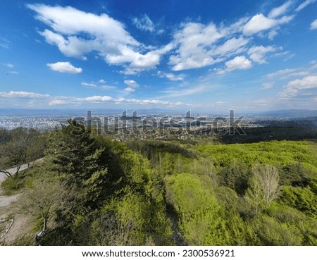 Aerial view of Sofia, Bulgaria overlooking the Sofia valley and Balkan mountains in the background, with Vitosha National Park in the foreground