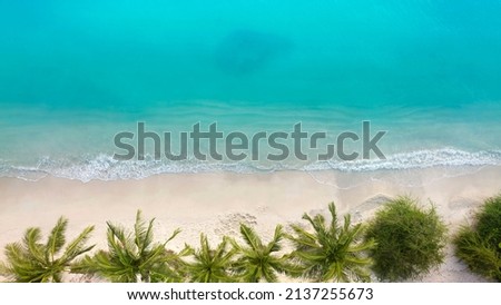 Aerial view with  Soft blue ocean wave on the beach and soft wave background.