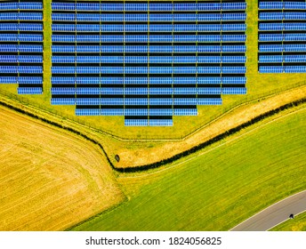 Aerial View Of Solar Batteries Field In English Countryside, UK