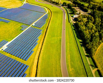 Aerial View Of Solar Batteries Field In English Countryside, UK