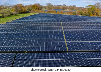 Aerial View Of Solar Farm In Welsh Valleys. Clean Energy Concept. Drone Shot.